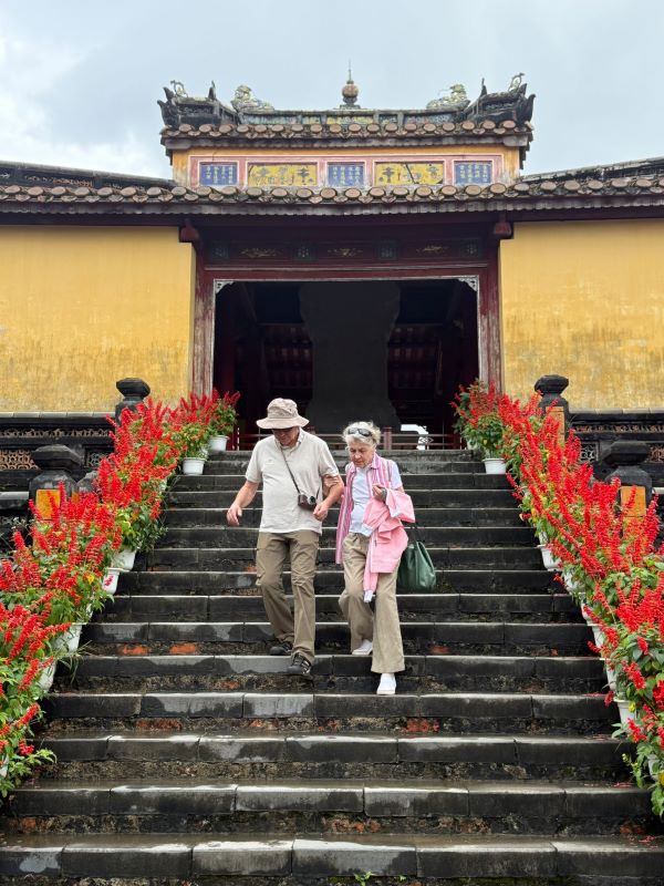A Nice Couple Visiting An Emperor's Tomb In Hue