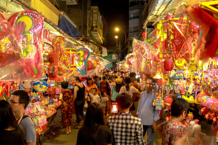 Vibrant colorful lantern stalls illuminated along Luong Nhu Hoc street in Cholon Ho Chi Minh City