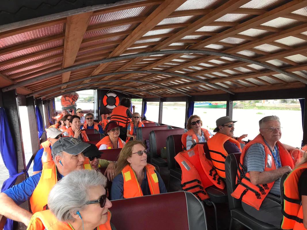 Enjoying A Boat Trip In Mekong River Delta In Vietnam