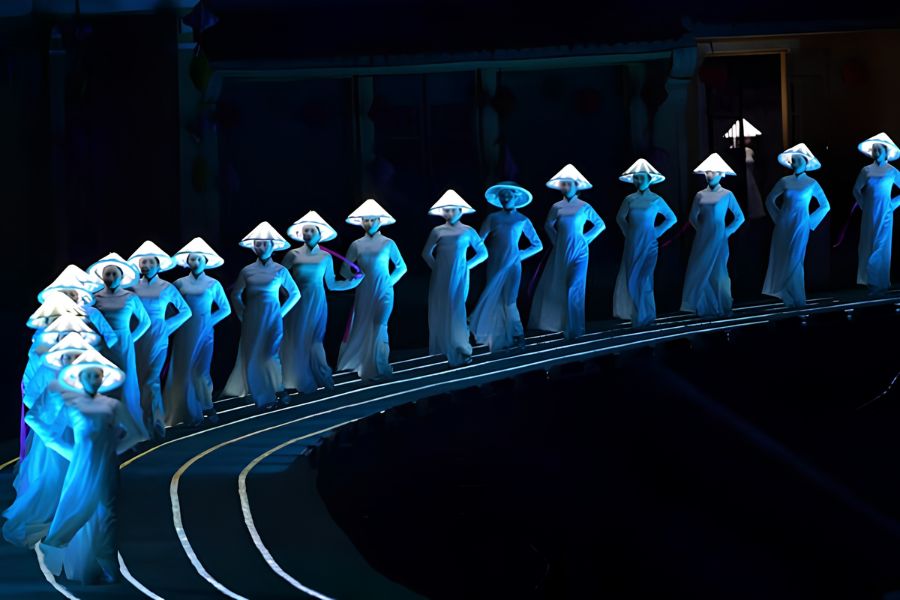 Performers wearing Vietnamese ao dai during the final act of Hoi An Memories Show