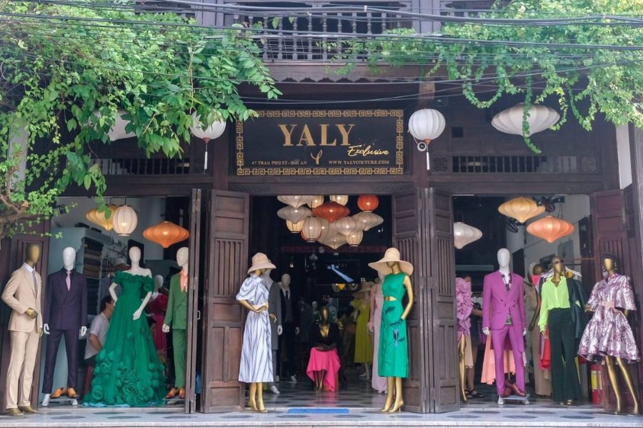 Interior of Yaly Couture in Hoi An with fabric displays and custom clothing