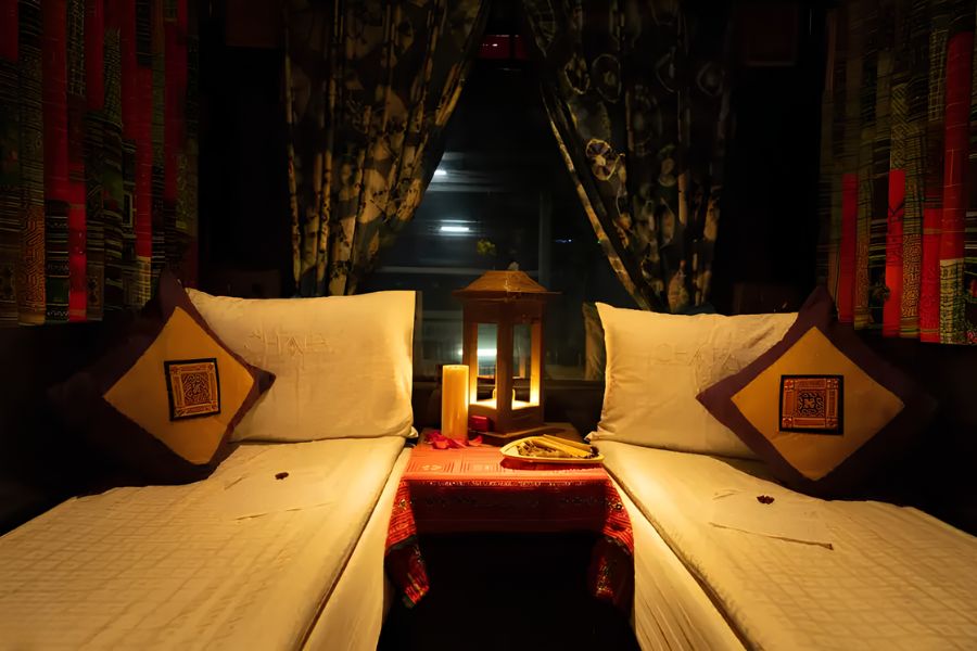 Premium two-berth sleeper cabin on a tourist train travelling from Hanoi to Lao Cai