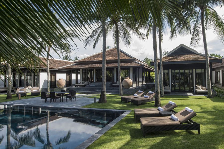 Beachfront villas and palm-lined grounds at Four Seasons Resort The Nam Hai near Hoi An